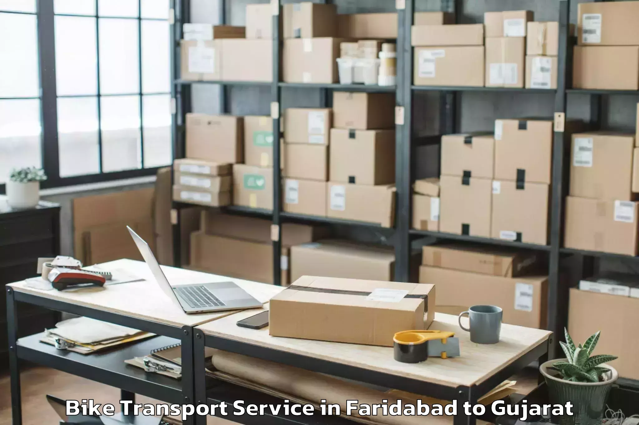 Book Faridabad to Keshod Airport Ixk Bike Transport